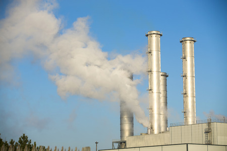 Industrial view of factory and smoke pollutionの写真素材