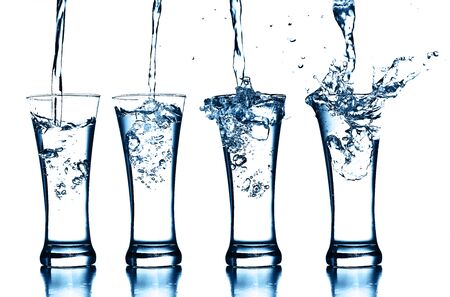 transparent glass of splash waterの写真素材