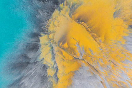 abstract colored dust explosion on a black background.abstract powder splatted background