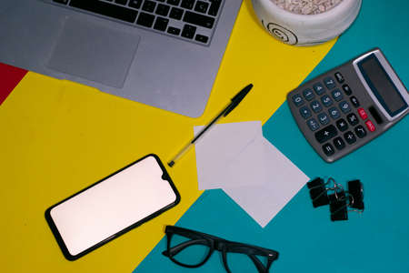 Modern workplace with laptop and accessories. Office desktopの写真素材