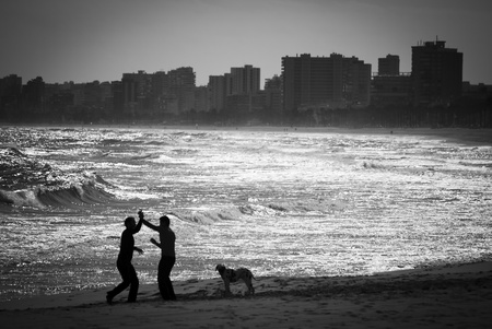 Two friends playing Capoira in San Juan Beach, Alicanteの写真素材