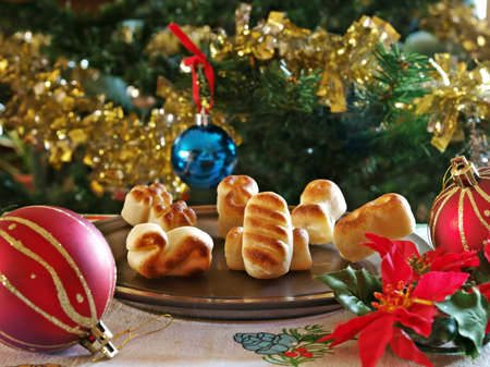 Christmas sweets and treeの写真素材