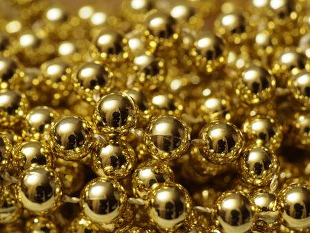 Macro shot of a golden christmas tree decorationの写真素材