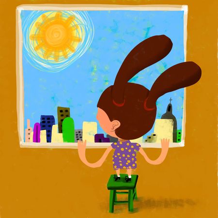 Young girl watches the sun from its windowの写真素材