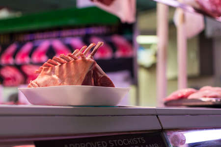 Meat rack on the counter of a butcher's shopの写真素材