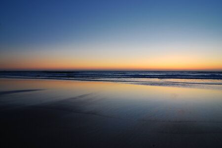 Sunset in beach Mar de Foraの写真素材