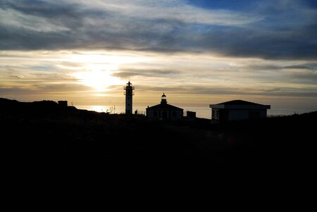 Sunset in Touri? ? an lighthouse galicia spainの写真素材