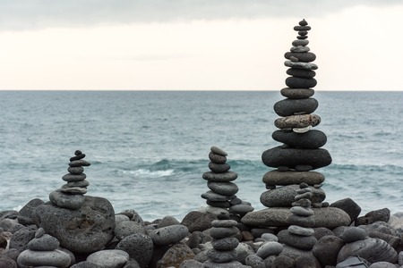 Volcanic rocks placed in pyramid mode, for enjoyment and relaxation. This unique place is located in the port of La Cruz in Tenerife (Spain)の写真素材