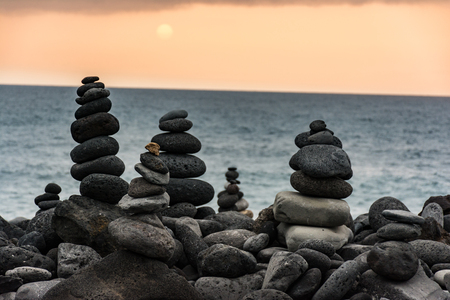 Volcanic rocks placed in pyramid mode, for enjoyment and relaxation. This unique place is located in the port of La Cruz in Tenerife (Spain)の写真素材
