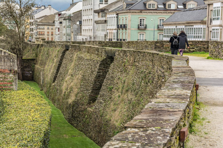 The Roman wall of Lugo surrounds the historic center of the Galician city of Lugo in the province of...