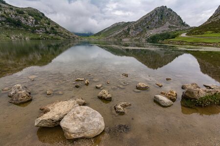 Enol lake in the mountains of the Picos de Europa in Asturias (Spain)の写真素材