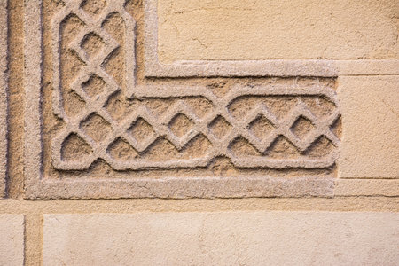 Traditional decorative pattern of the facades of the houses in the historic Jewish quarter of...