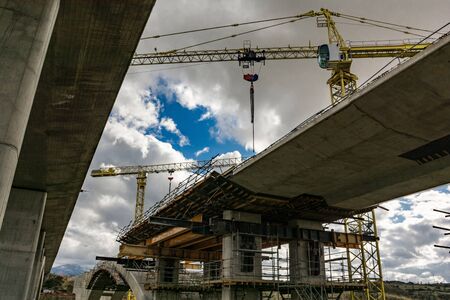 Construction of the structure of a bridge for a motorway in Spain on the ring road of Segoviaの写真素材