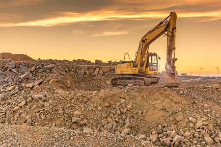 Excavator on the road construction works. Machinery needed for construction