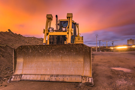 Excavator on the road construction works. Machinery needed for construction