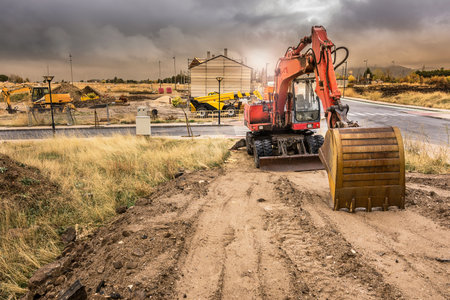 An orange bulldozer at a construction site