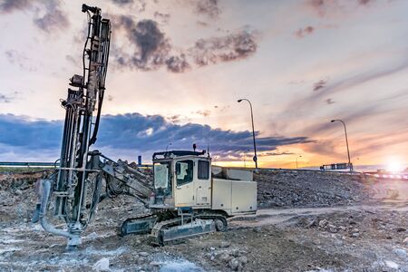Professional drilling rig doing a geotechnical study of the terrainの写真素材