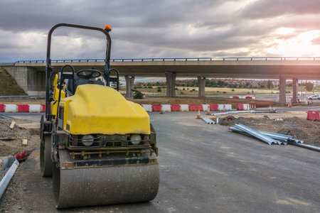 Small steamroller repairing a highway