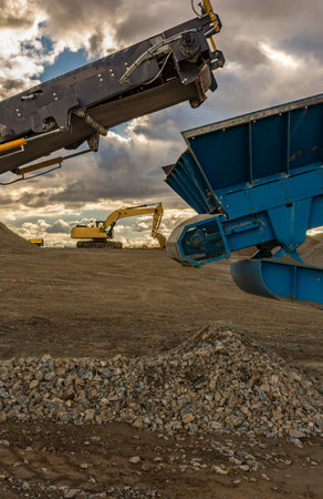 Heavy machinery in a quarry doing workの写真素材