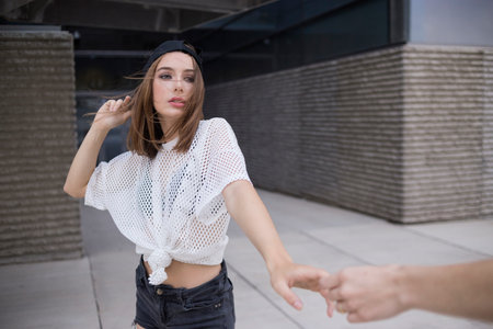 Young girl cap fashion posing
