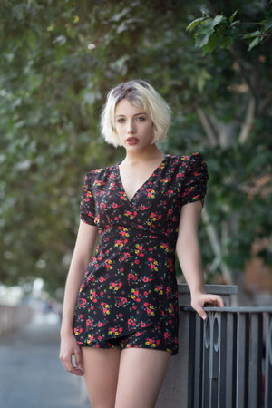 Portrait of a blonde girl on the stairs of a subway