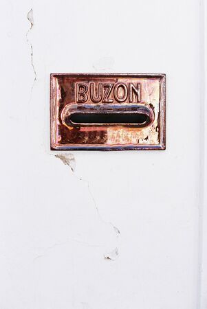 Mailbox detail in Seville, Spain inside a portal in the historic center. It writen 'buzon' which means the place to put the correspondenceの写真素材
