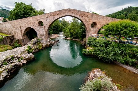Old Roman stone bridge in Cangas de Onis (Asturias), Spainの写真素材