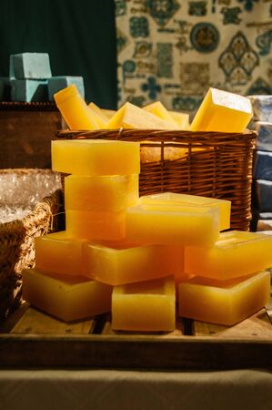 detail of some handmade scented soaps sold at a craft fair. Yellow vintage soap.の写真素材
