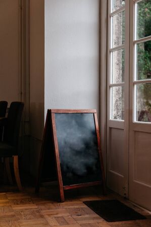 blackboard sign inside a vintage coffee shopの写真素材