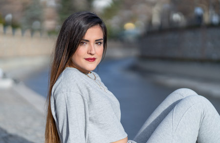 Pretty woman with the river in the background