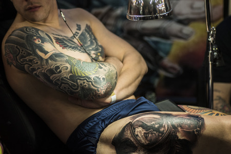 Tattoos in a young man bodyのeditorial素材
