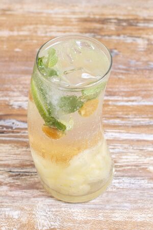 Italian yellow fruit soda with mango, cape gooseberry and pearの写真素材