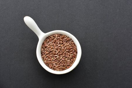 Flaxseeds displayed in containersの写真素材