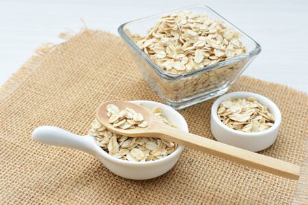 Oat flakes (Avena sativa) displayed in containersの写真素材