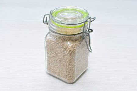 Quinoa seeds (Chenopodium quinoa) displayed in containersの写真素材