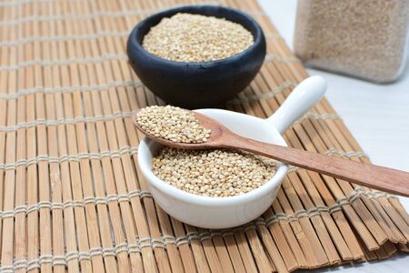 Quinoa seeds (Chenopodium quinoa) displayed in containersの写真素材