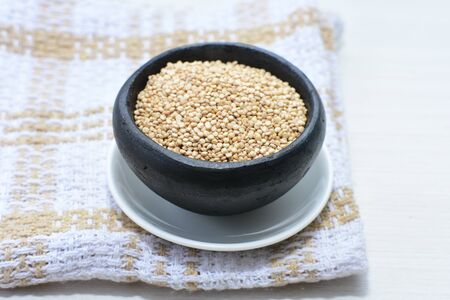Quinoa seeds (Chenopodium quinoa) displayed in containersの写真素材