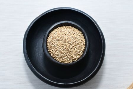 Quinoa seeds (Chenopodium quinoa) displayed in containersの写真素材