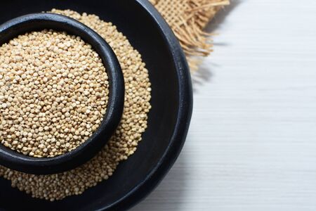 Quinoa seeds (Chenopodium quinoa) displayed in containersの写真素材