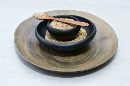 Quinoa seeds (Chenopodium quinoa) displayed in containersの写真素材