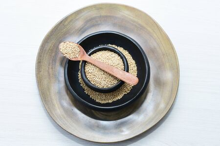 Quinoa seeds (Chenopodium quinoa) displayed in containersの写真素材