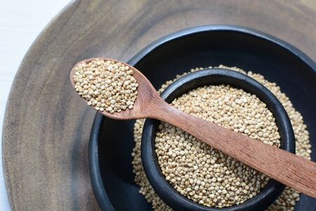 Quinoa seeds (Chenopodium quinoa) displayed in containersの写真素材