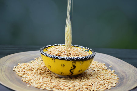 Avena sativa - Raw and natural watered grain oats, displayed in containers, flat bottom