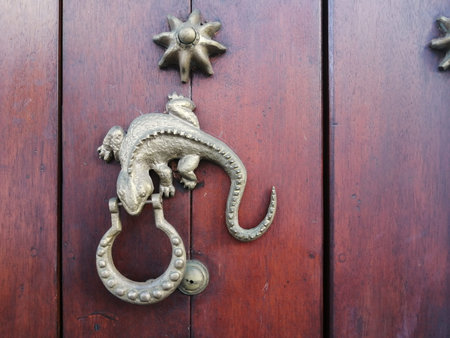 Knockers on the old gates of the walled city, different metal materials in the city of Cartagena de...