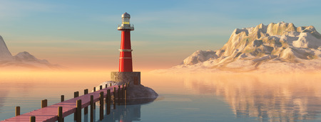 lighthouse on the coast and sunset reflected in waterの写真素材