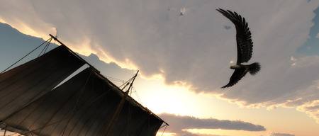 ship and Eagle flying in the clouds at dawnの写真素材