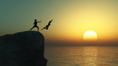 woman pushing another off a cliffの写真素材