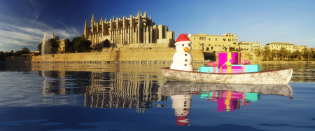 Majorca cathedral in Balearic Islands and boat with giftsの写真素材
