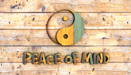 wooden board with yin yang symbolの写真素材