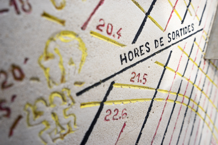 sundial carved in rock painted colorsの写真素材